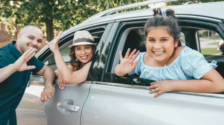 family in car