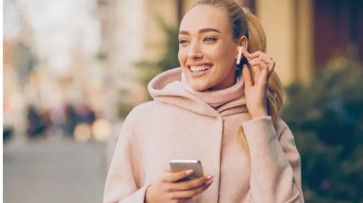 woman wearing AirPods