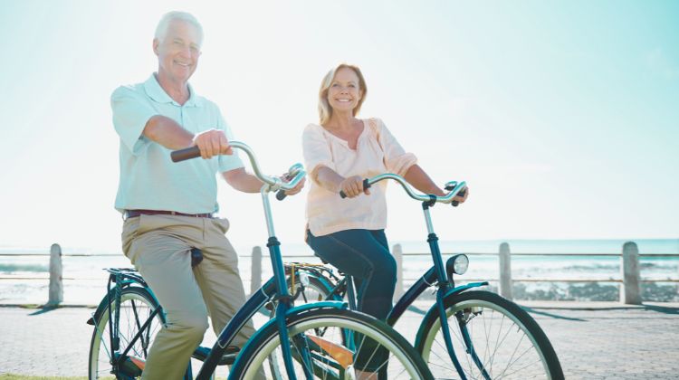 senior couple riding bikes