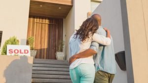 couple looking at new home they bought