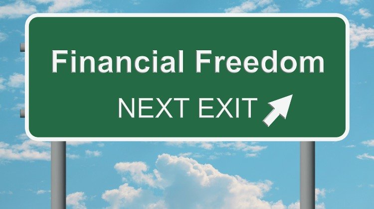 an illustration of a highway sign point to "financial freedom"