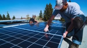 solar installation team on a home roof