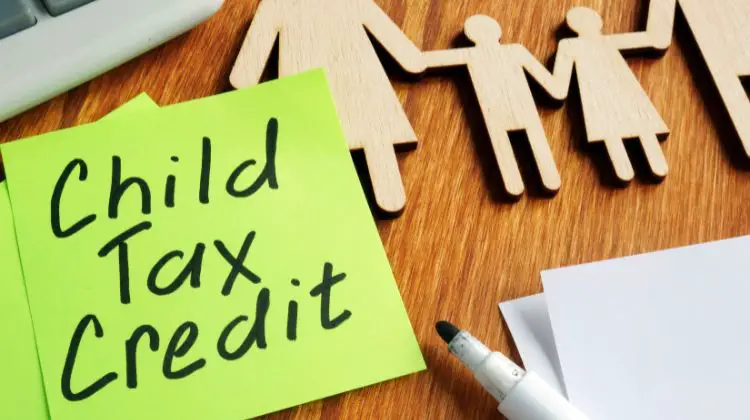 sticky note that says "child tax credit"