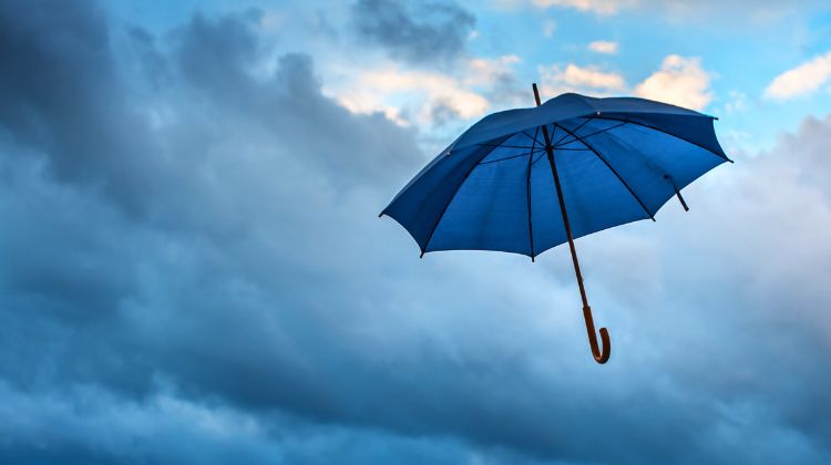 umbrella floating through sky
