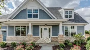 home with a visual of cash on the front porch to represent equity