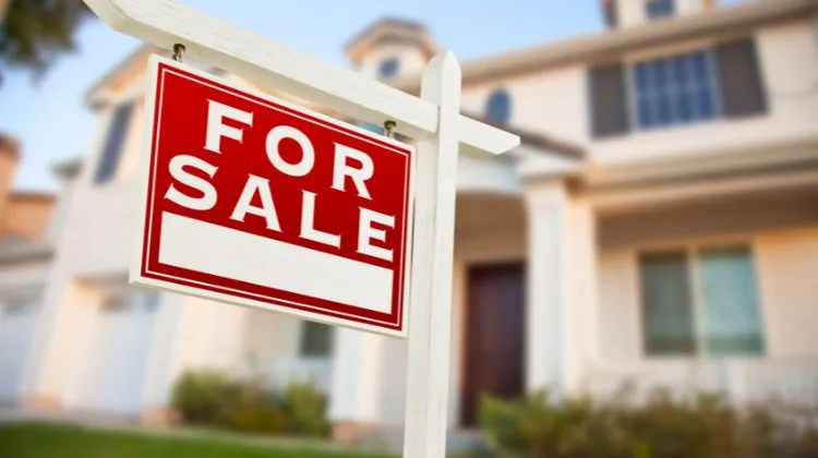 home with for sale sign - what credit score you would need to buy a home